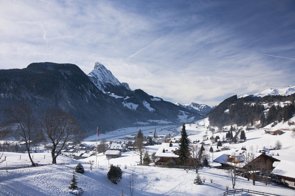 Landscape of Gstaad in Switzerland, with snow in winter