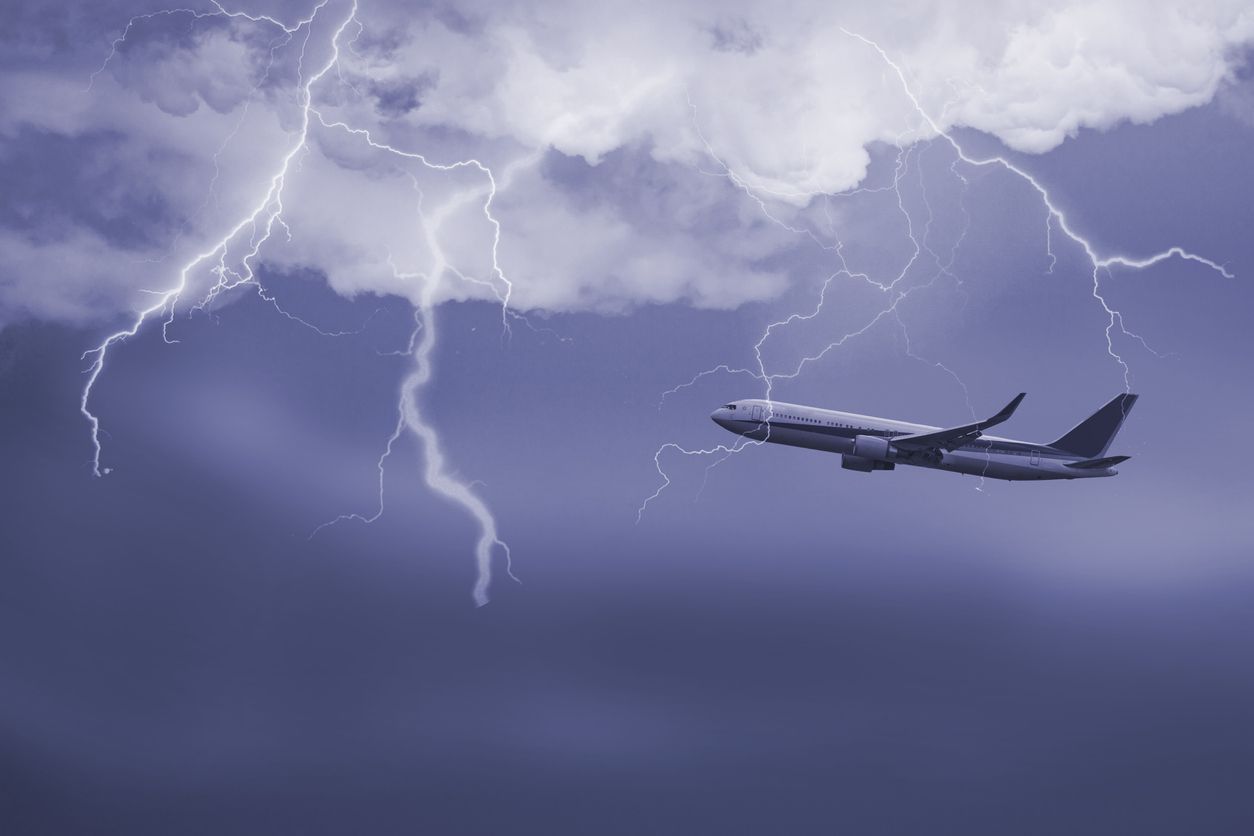 jet travelling through  stormy sky