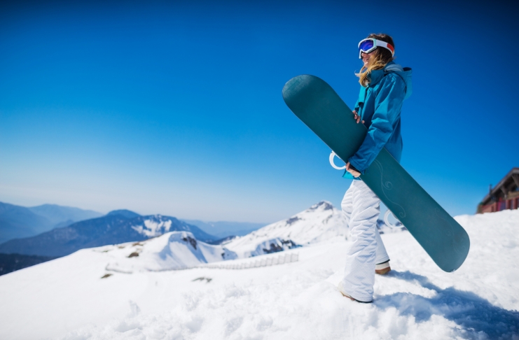 young snowboarder woman