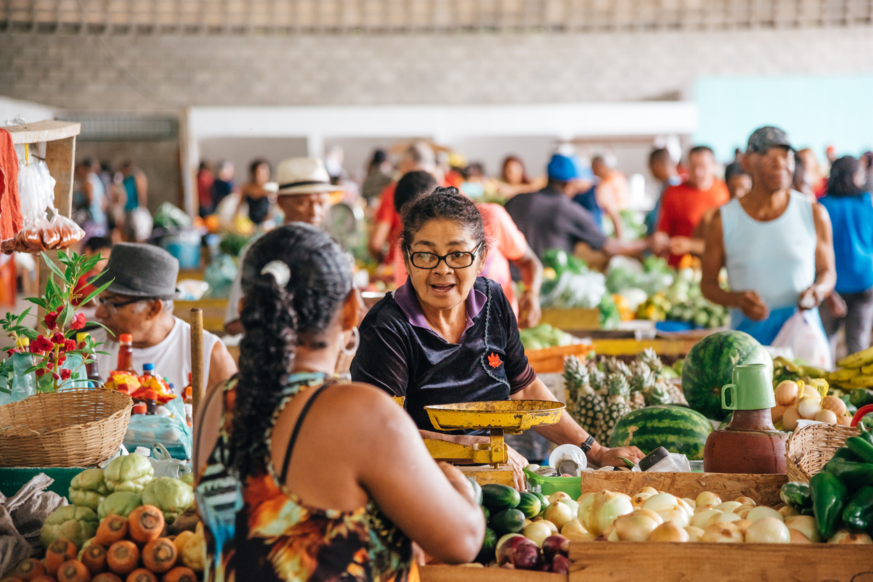 people in market hall in in Monte Gordo, Bahia Brazil,