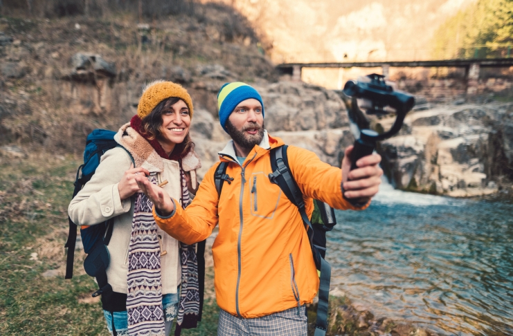 Couple hiking, vlogging and having fun